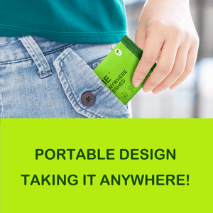 Hand placing a TINKKIE portable body wipes travel pack into a denim pocket