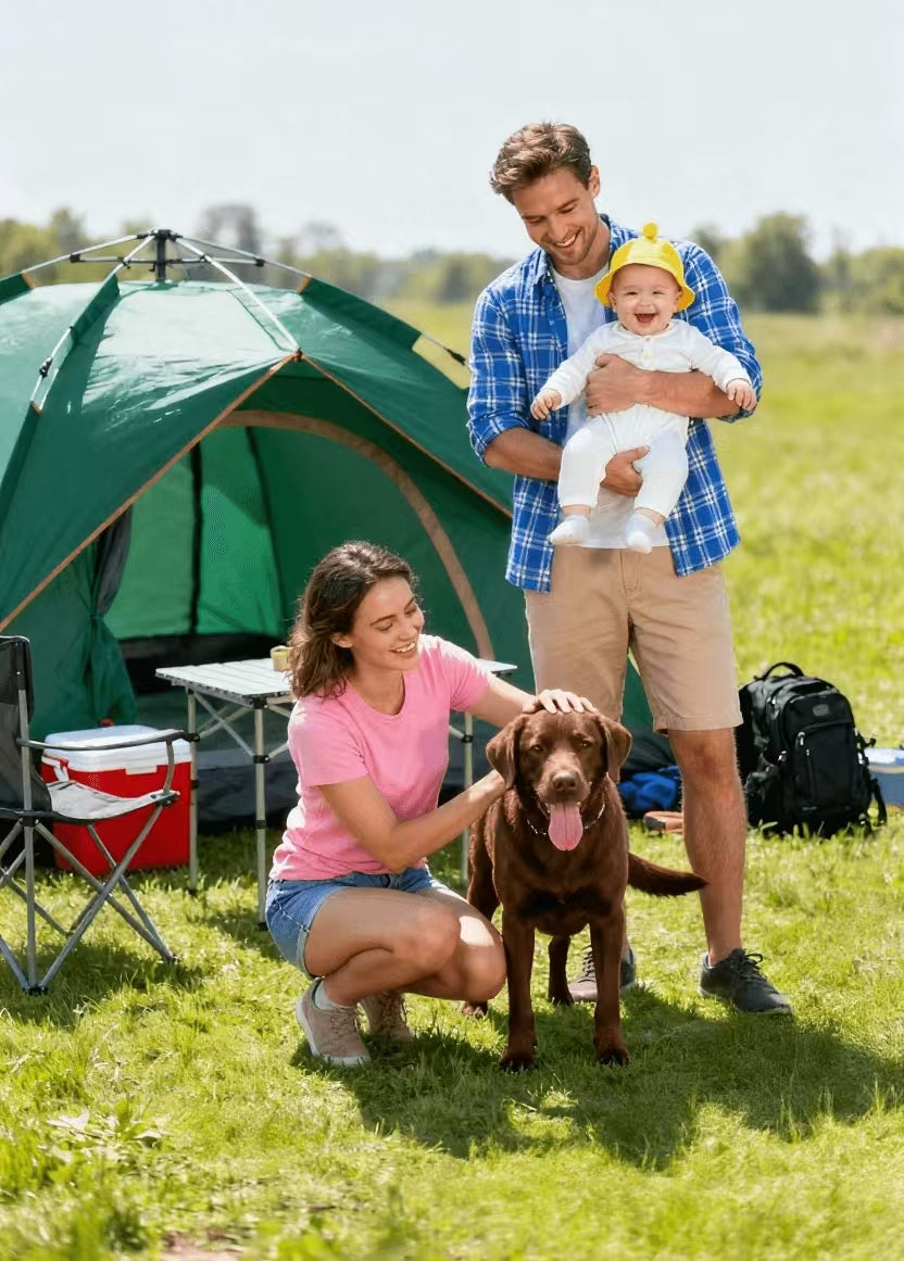 A family camping outdoors with their baby and pet, representing TINKKIE portable wipes for on-the-go freshness anytime, anywhere.
